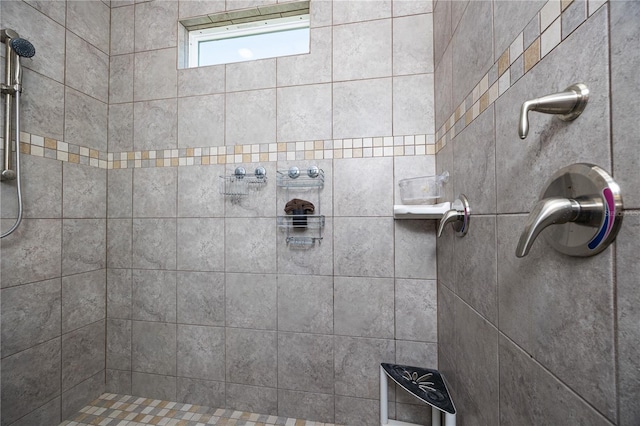 bathroom featuring tiled shower