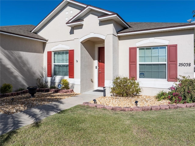 view of front of home with a front yard