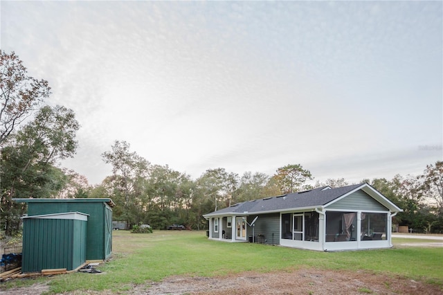 back of house featuring a yard