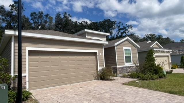 view of front of house with a garage