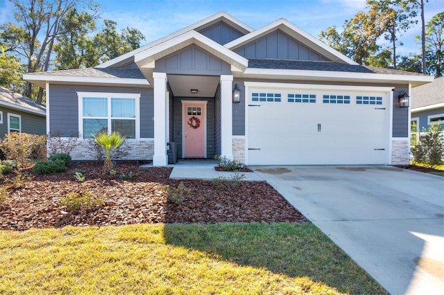 craftsman-style house featuring a garage