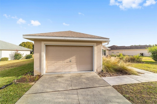 garage with a yard