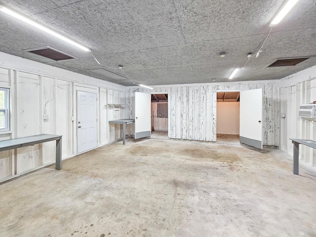 garage with a wall mounted AC