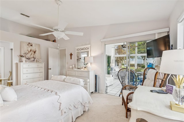 bedroom with light carpet, vaulted ceiling, and ceiling fan