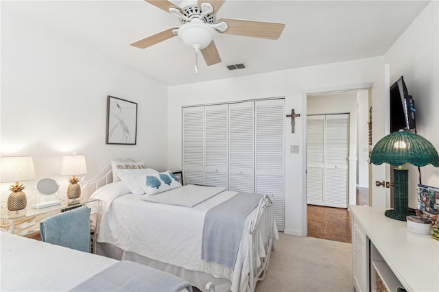 bedroom featuring ceiling fan and light parquet flooring