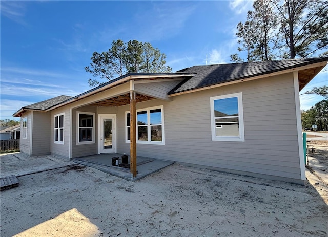 back of house featuring a patio