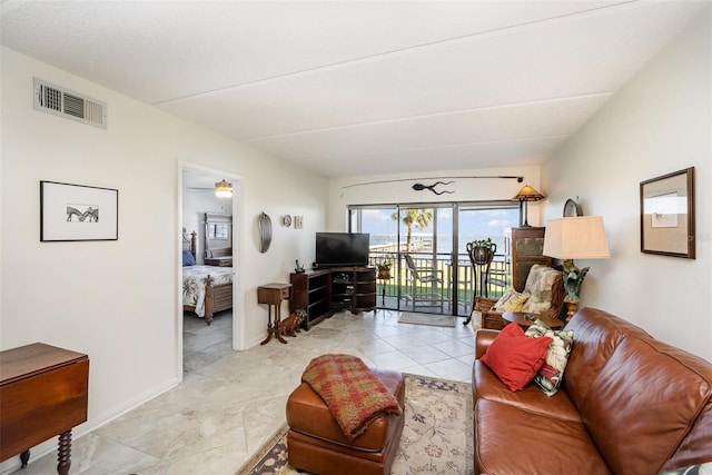 living room featuring ceiling fan