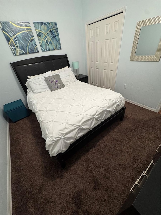 carpeted bedroom with a closet