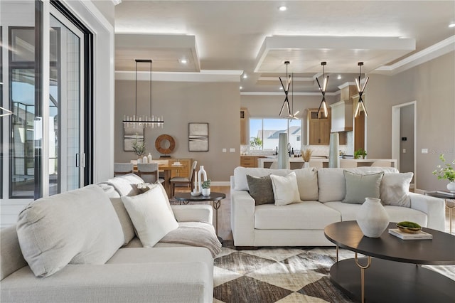 5040 SW 125th Cir, Archer, FL 32618 - living room with recessed lighting, a raised ceiling, and ornamental molding