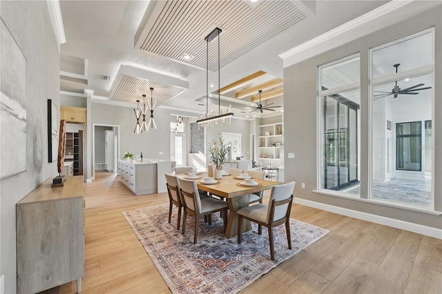 5040 SW 125th Cir, Archer, FL 32618 - dining space featuring ceiling fan, light wood finished floors, and ornamental molding