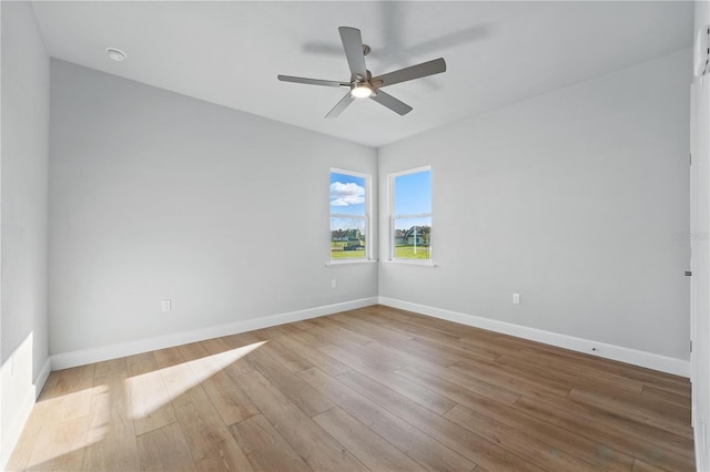 5040 SW 125th Cir, Archer, FL 32618 - empty room with ceiling fan and wood finished floors