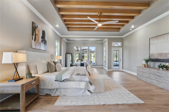 5040 SW 125th Cir, Archer, FL 32618 - bedroom with multiple windows, beamed ceiling, wood finished floors, access to exterior, and ornamental molding