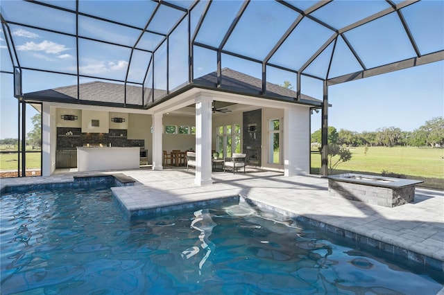 5040 SW 125th Cir, Archer, FL 32618 - outdoor pool with exterior kitchen, a patio area, a lanai, and a ceiling fan