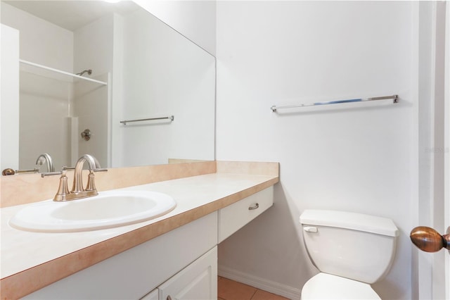 bathroom with a shower, tile patterned flooring, vanity, and toilet