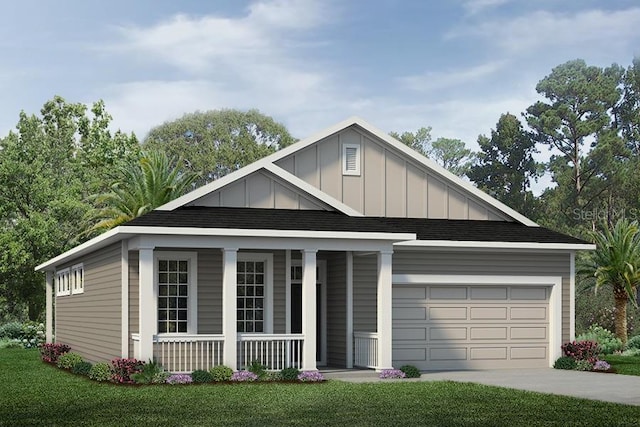 view of front of property featuring covered porch and a garage