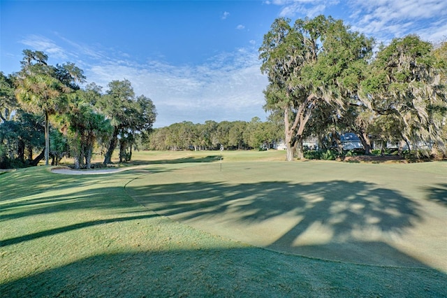 surrounding community featuring a lawn