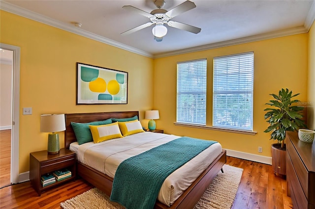 4715 SW 91st Dr Unit 305, Gainesville, FL 32608 - bedroom with crown molding, wood finished floors, and a ceiling fan