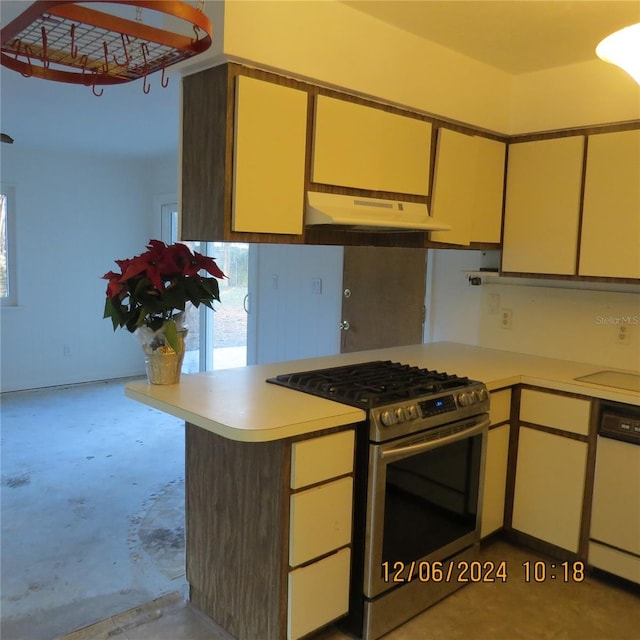 kitchen with kitchen peninsula, white dishwasher, and stainless steel gas range