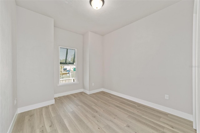 unfurnished room featuring light hardwood / wood-style flooring