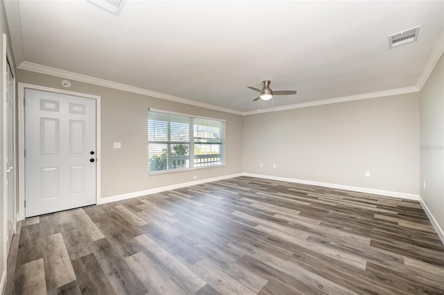 interior space with hardwood / wood-style flooring, ceiling fan, and ornamental molding