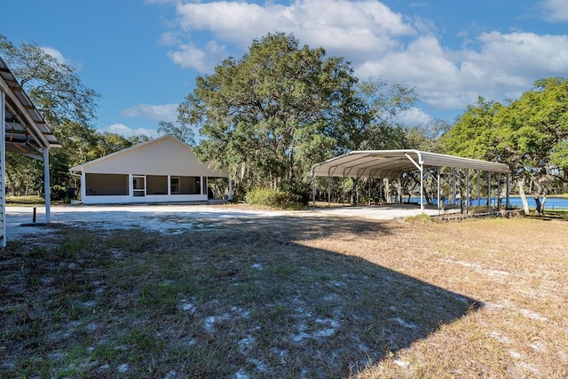 view of yard featuring a carport