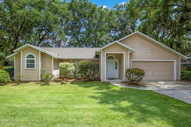 single story home with a garage and a front lawn