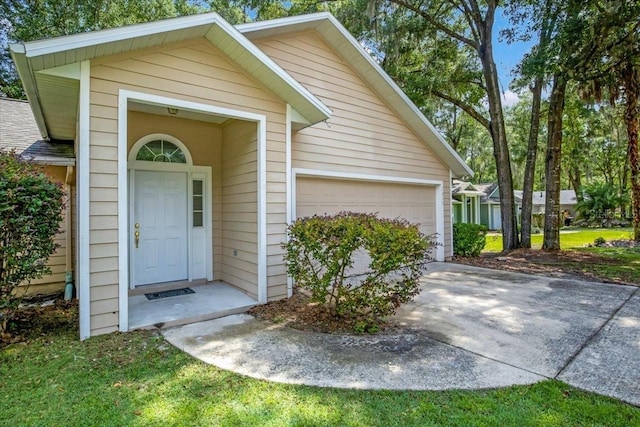 view of exterior entry featuring a garage