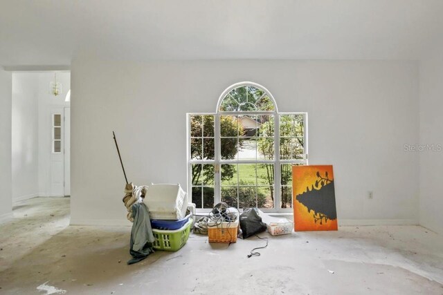 interior space featuring concrete flooring