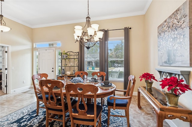 dining area with light tile patterned flooring, a chandelier, and ornamental molding