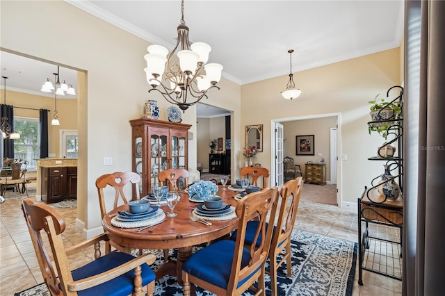 tiled dining area with ornamental molding and a chandelier