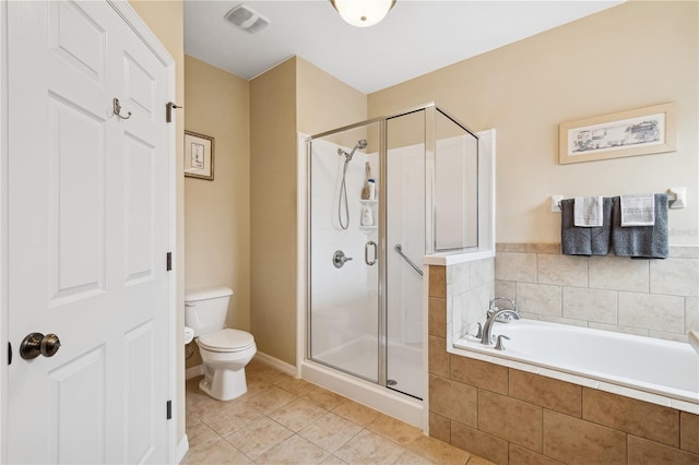 bathroom featuring tile patterned floors, shower with separate bathtub, and toilet