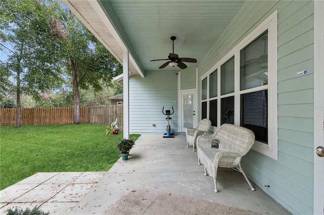 view of patio featuring ceiling fan