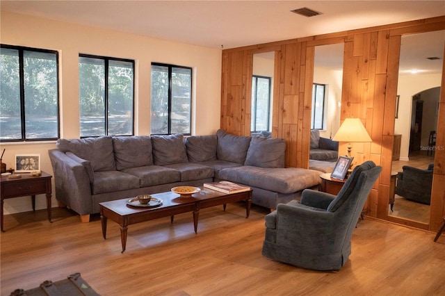 living room with light hardwood / wood-style flooring