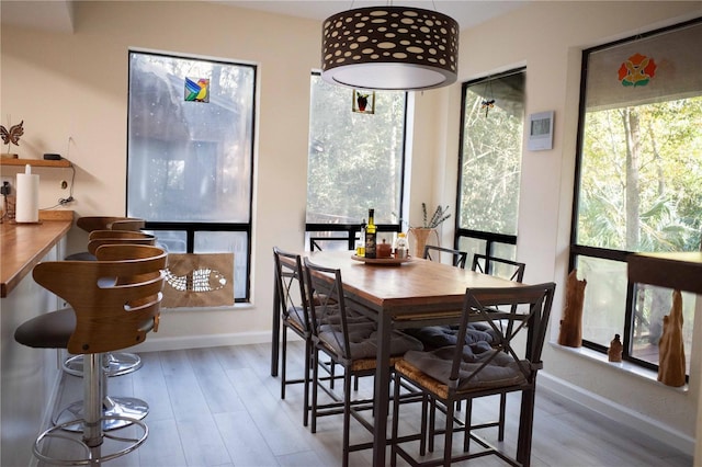 dining room featuring light wood-type flooring