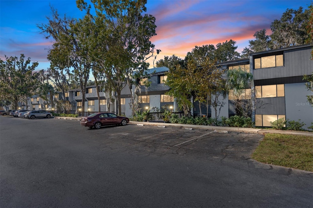 view of outdoor building at dusk