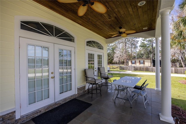 view of patio with ceiling fan, french doors, and covered porch