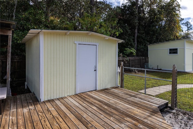 view of outbuilding featuring a lawn