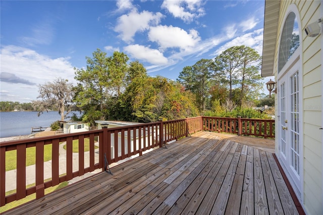 wooden terrace with a water view