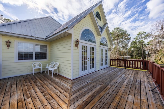 wooden deck featuring french doors