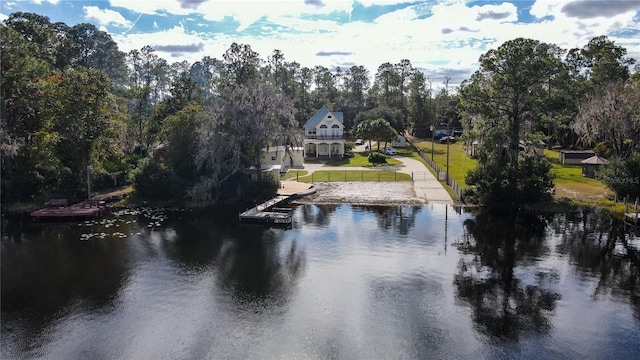 property view of water with a dock