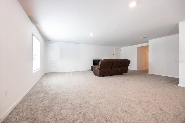 unfurnished room featuring carpet floors