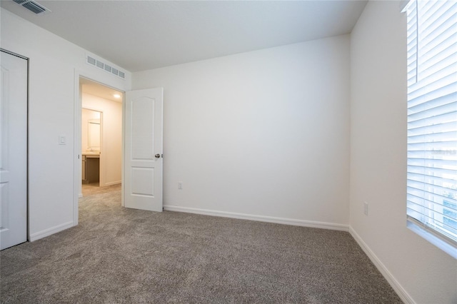 view of carpeted spare room