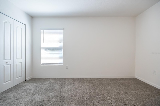 spare room featuring carpet flooring