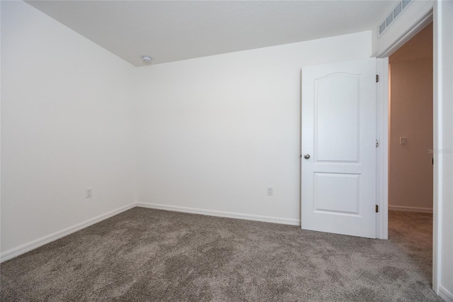 unfurnished room with carpet floors