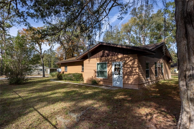 exterior space with a front yard