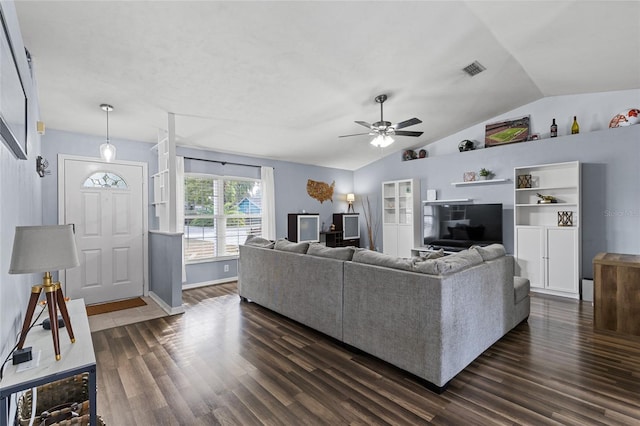 living room featuring lofted ceiling, ceiling fan, and dark wood-type flooring