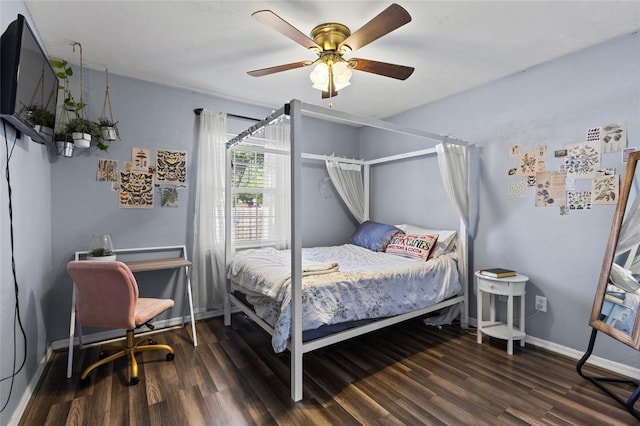 bedroom with ceiling fan and dark wood-type flooring