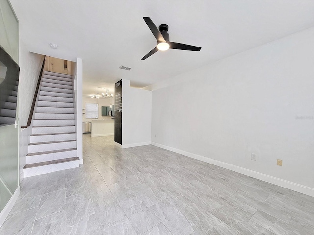 unfurnished living room featuring ceiling fan