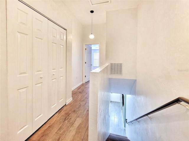 hallway featuring light hardwood / wood-style flooring