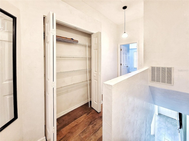 interior space with dark wood-type flooring